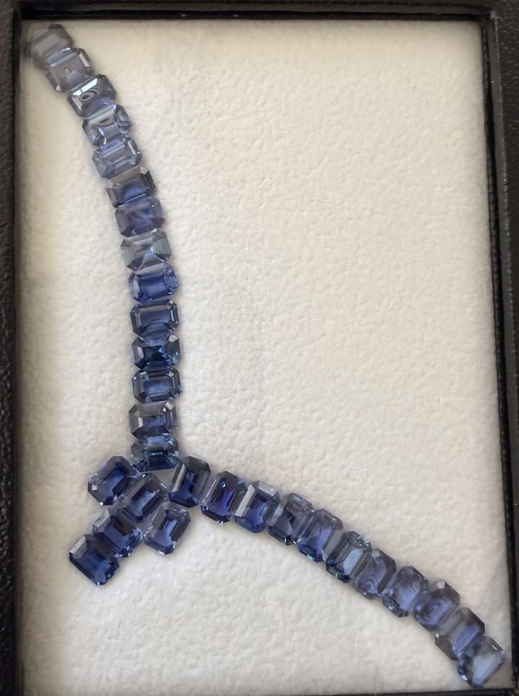Sapphire necklace in a display case